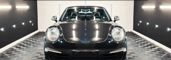 Porsche with swirled, hazy paint before ceramic coating